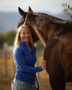 portrait of Katie Seabaugh with brown horse